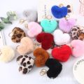Fur ball key chain love car pom leopard print hair new heart shaped fluff ball keychain ladies bag pendant key ring jewelry. 