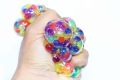 Squeezy Mesh Ball Squishy Toy With Rainbow Color Orbeez Inside. 