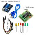 Arduino Uno with cable motor driver jumper wire leds. 