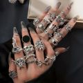 24pcs Gothic Ring Set Trendy Joker Face Devil Smile Face Patterns Zinc Alloy Mix And Match For Daily Outfits Party Accessories. 