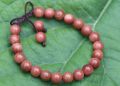 Powerful Sun Stone Wrist Mala. 