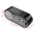 Wireless BT Speaker Small Alarm Clock with Dual Alarms Human-Activated Living Room Office Decoration. 