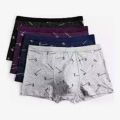 Pack Of 4 Men Boxer Cotton Underwear Shorts Briefs (Color / Print May Vary). 