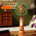 Compact Retro Portable Electric Fan Quiet Operation Strong Wind Handheld Mini Fan Vintage 3 Speeds Rechargeable Fan Desktop Use. 