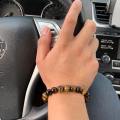 8 MM Tiger Eye Unisex Bracelet. 