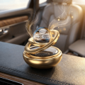 Practical Aromatherapy Function Aluminum Alloy Material Car Perfume Diffuser Automatic Rotation Star Suspension Design Solar Rotating Diffuser Solar Powered Compact Modern Appearance Car Aroma Diffuser Car Interior Decoration. 
