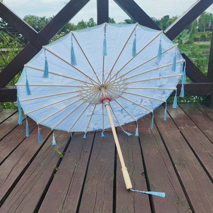 Vintage%2070cm%20Silk%20Fabric%20Tassel%20Umbrella%20Handheld%20Chinese%20Style%20Classical%20Oil%20Paper%20Umbrella%20Windproof%20Decorative%20Tassel%20Umbrella%20Hanfu%20Photography%20Prop%20-%20Image%206