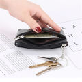 Small size Women wallet Versatile Coin compartment Keychain feature Mini purse Fashionable PU leather for Daily use Travel accessory Gift option Essential item Suitable for all ages. 