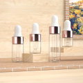 Mini Born 10/20pcs Mini Dropper Bottles Glass Empty Essential Oil AromaHot Selling therapy Bottles Rose Gold Cap Pipettes Bottles 1ml 2ml 3ml 5ml. 