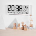 LCD Digital Alarm Clock with Temperature Sensor Desktop & Wall Mountable Manual & Automatic Display Adjustability Durable Easy Install Easy to Use. 