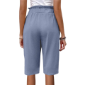 Women's solid color button casual pants Light blue XXL. 