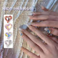 2023 Trendy Nail Art Crystal Iridescent Slanted Moonlight Peach Pointed Bottom Heart. 