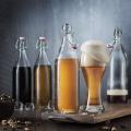 Transparent Swing Top1 Liter ( Pack) ROUND Clear Glass Grolsch Flip Top Bottle With Stopper, for Beverages, Smoothies, Kefir, Beer, Soda, Juicing, Kombucha, Water, Milk, Oil and Vinegar  Glass Water Bottles with Latch Lock and Stopper  Silicone Grip. 