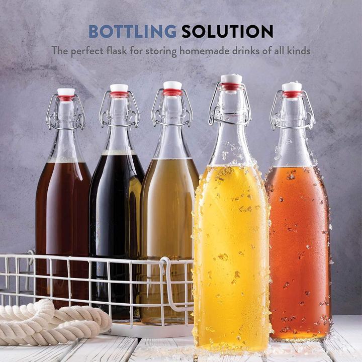 Transparent%20Swing%20Top1%20Liter%20(%20Pack)%20ROUND%20Clear%20Glass%20Grolsch%20Flip%20Top%20Bottle%20With%20Stopper,%20for%20Beverages,%20Smoothies,%20Kefir,%20Beer,%20Soda,%20Juicing,%20Kombucha,%20Water,%20Milk,%20Oil%20and%20Vinegar%20%20Glass%20Water%20Bottles%20with%20Latch%20Lock%20and%20Stopper%20%20Silicone%20Grip%20-%20Image%203