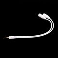 Cable splitter of white earphones 3.5 mm audio. 