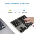 2.4G Wireless Bluetooth Number Pad 35 Keys Remote Connection Numpad Numeric Keypad for Laptop Window Digital Keyboard A. 