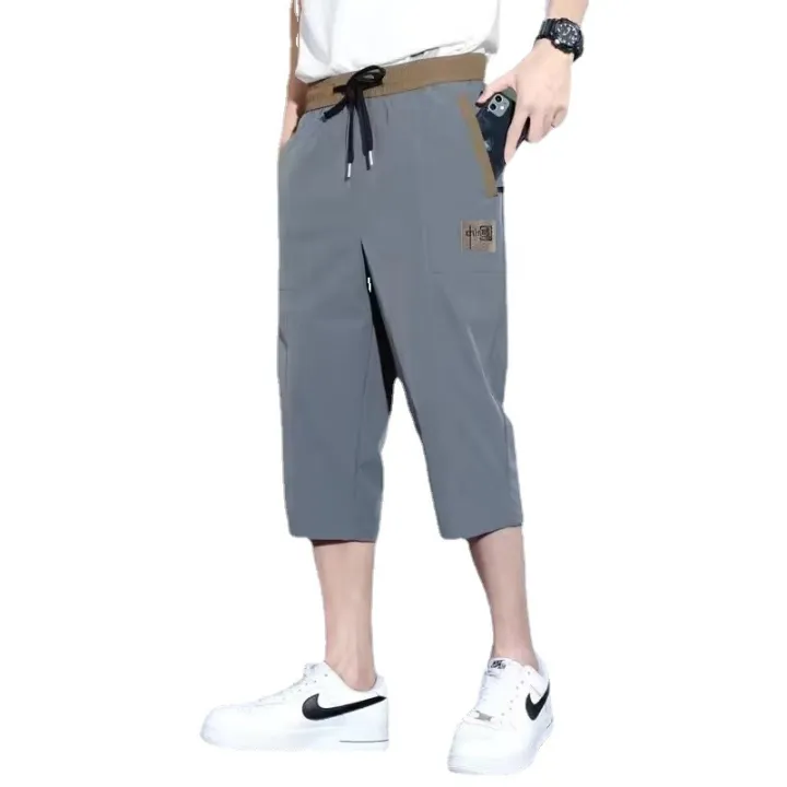 Douyin%20cropped%20slacks,%20men's%20elastic%20waist,%20loose%20shorts,%20trendy%20embroidered%20Chinese%20ice%20silk%20quick-drying%20sports%20pants%20-%20Image%205