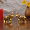 Handicrafts Set of Two Piece Metal Sculptures Elephant Pair for Showpiece and Decoration | Elephant Statue Pair in Golden Finish Having Attractive Look Decorative Showpiece - 6.25 cm  (Brass, Gold). 
