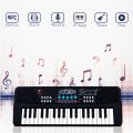 37 Key Piano Keyboard Toy With Dc Power Option, Recording & Mic For Kids, Plastic - Latest Model - Black (Pack Of 1). 