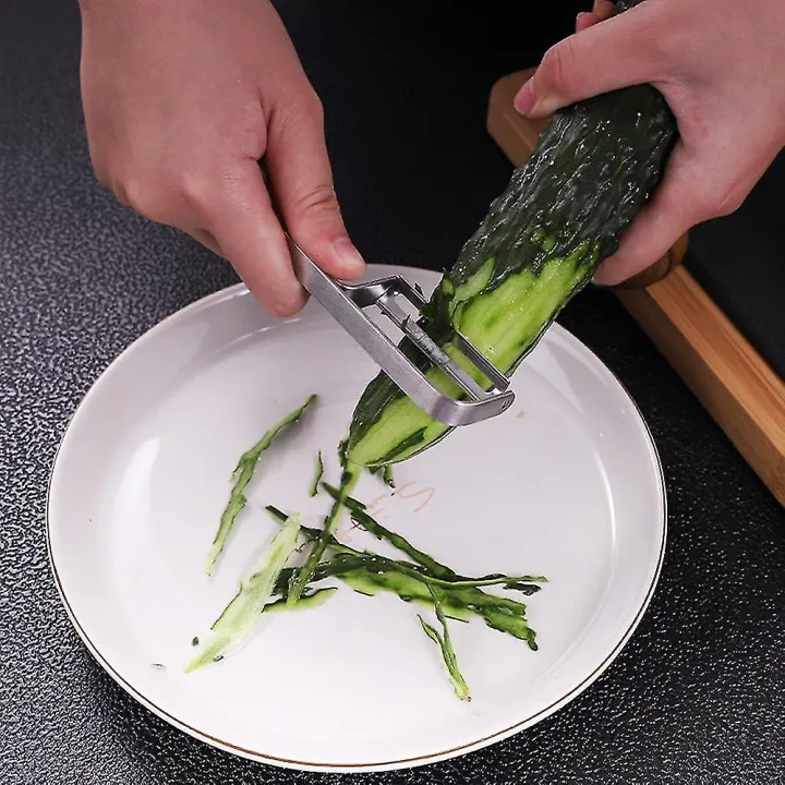 Sampa%20Stainless%20Steel%20Peeler%20With%20Razor%20Sharp%20Cut%20Peeling%20Potatoes%20And%20Other%20Vegetables%20-%20Image%204