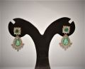 Diamond Earing with Emerald. 
