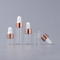 Mini Born 10/20pcs Mini Dropper Bottles Glass Empty Essential Oil AromaNew style therapy Bottles Rose Gold Cap Pipettes Bottles 1ml 2ml 3ml 5ml. 