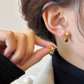 Medra style knotted tiger's eye stone stud earrings for women unique niche design sense of high-end earrings for girlfriend fashion earrings. 