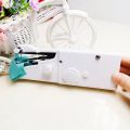 Mini Handy Stitch Portable Hand Sewing Machine. 