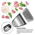 Stainless Steel Garlic Press: Efficient Kitchen Masher Tool. 