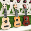 Beige Kids Classical Ukulele Guitar Toy Early Education Small Guitar Supplies Adjustable. 