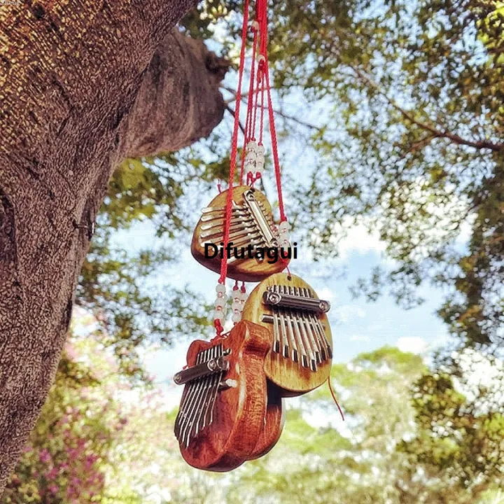 Difutagui%20Zheng%20Set%20Gift%20Portable%20Musical%20Instrument%20Drop%20Bag%20Thumb%20Kalimba%202025%20New%20Sales%20promotion%20Mini%208%20Key%20Piano%201%20Style%20Cute%20and%20Beautiful%20Kids%20-%20Image%206