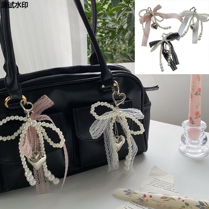 Country%20Y2K%20Beauty%20Car%20Keychain%20Han%20Sweet%20Pearl%20Bow%20Ladies%20Keychain%202025%E6%96%B0%E5%93%81%EF%BC%8CJinnikaiji%20Heart%20Shaped%20Lace%20Pendant%20Bag%20Pendant%20Accessories%202025%20New%20Gifts%20-%20Image%202