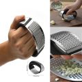 Stainless Steel Garlic Press: Efficient Kitchen Masher Tool. 