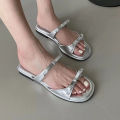 es ladies aussur season shoes ch 2024 flat slippers ladies new double bow trend silver black flat sandals sandals mules ladies summer. 