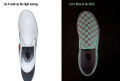Vans Classic Slip-On Glow Checkerboard Shoe. 