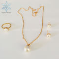Gold Plated Panchadhatu White Pearl Jewellery Set With 2 Earrings, 1 Ring And Necklace For Women. 