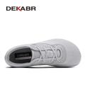 DEKABR New Couple Shoes New Style Flying Weaving Breathable Basic Lace Up Pedaling Lazy Summer Casual Sneakers. 