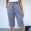 Women's solid color button casual pants Light blue XXL. 