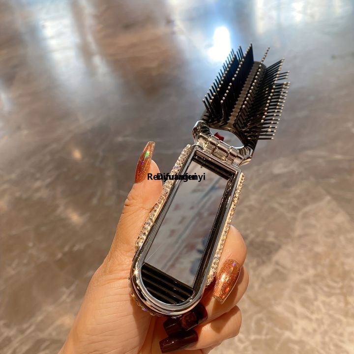 Difutagui%20High%20appearance%20level%20air%20cushion%20folding%20comb%20artificial%20diamond%20Luxury%202025%20New%20set%20with%20mirror%20mini%20portable%20all-in-one%20massage%20comb%20-%20Image%205