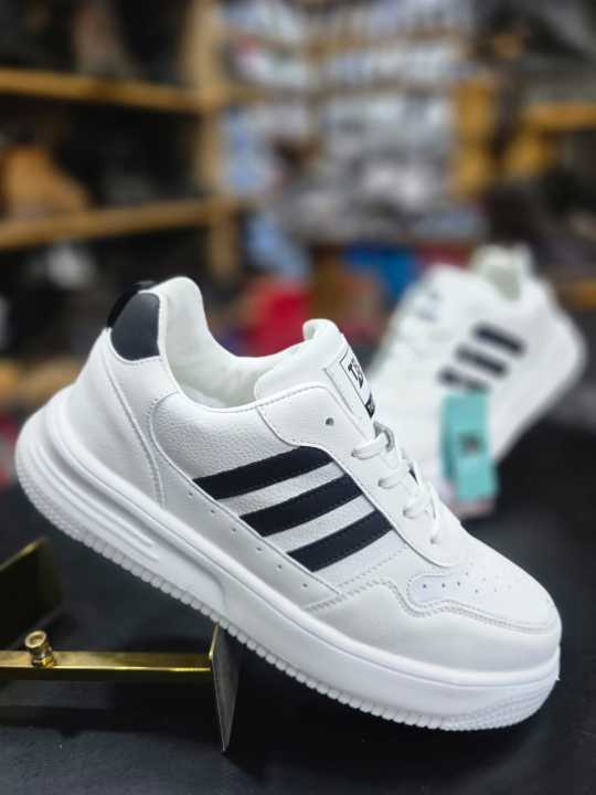 Unisex%20White%20&%20Black%20Casual%20Sneakers%20with%20Triple%20Stripe%20Design%20%7C%20Everyday%20Streetwear%20ShoesMen%20and%20Women%20-%20Image%202