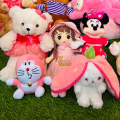 Dressed Doll, Barbie, Bunny, and Doraemon Combo Set. 