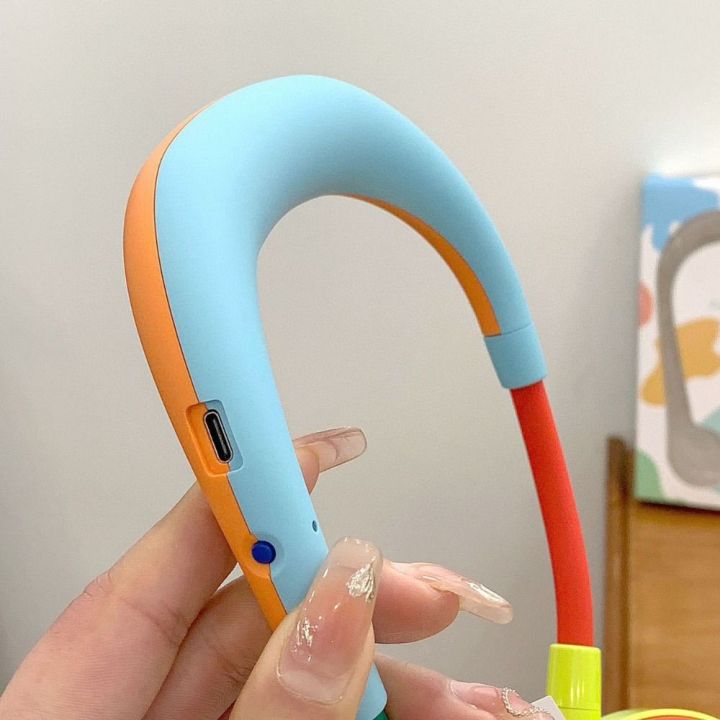 Personal%20Cooling%20Foldable%20Design%20Bladeless%20Neck%20Fan%20Low%20Noise%20Operation%20Lightweight%20Construction%20Portable%20Neck%20Fan%20Powered%20360%C2%B0%20Cooling%20Wearable%20Personal%20Fan%20Working%20Environment%20-%20Image%208