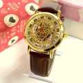 Golden/Brown Roman Skeleton Dial Analog Watch For Men - Brown. 