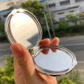 Double Sided Pocket Mirror. 