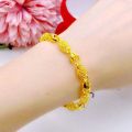 Sand gold jewelry light luxury high-end hollow transfer bead exquisite bracelet women's design sense simulated gold hand jewelry wholesale. 