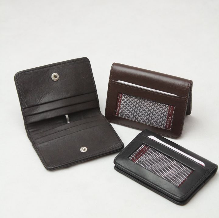 Genuine cow leather wallet for men pure original cow leather | bifold | one tich button for opening of  wallet | seven card holding compartment | one cash compartment | two colors black & brown |  easy to carry | high product in cheap prize