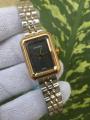 Channel Gold-Tone Rectangle Watch - Swiss-Made Luxury Timepiece with Dual-Tone Bracelet for Women. 