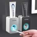 Toothpaste Dispenser Toothbrush Holder - White Multi-Functional Wall Mounted Toothpaste Squeezer Set of Brush Holder and Tooth paste Dispenser Wall Mounted Plastic Toothpaste Dispenser Tooth Paste with Tooth Brush Holder Best Quality Al Urus. 