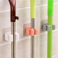 Wall Mounted Mop & Broom Holder – Self-Adhesive, Waterproof Multi-Tool Organizer Rack with Hooks – No Drill, Space-Saving Storage Solution for Kitchen & Bathroom Cleaning Tools. 