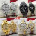 CD COLLECTION COUPLE WATCHES METALLIC CHAIN AND CUT CASE WITH PUSH BUTTON LOCK DIFFERENT COLOURS AVAILABLE WITH FREE BOX. 